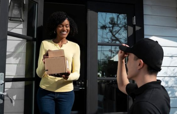 A woman receiving a delivery